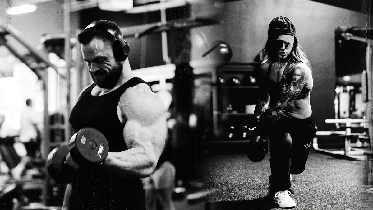 Two athletes training with dumbbells in a gym, one curling and one mid-lunge