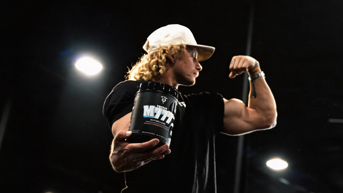 Die Tryin Co Athlete holding M777