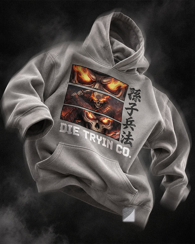Grey hoodie with flaming skull panels and Chinese Art of War characters floating against a dark smoky backdrop