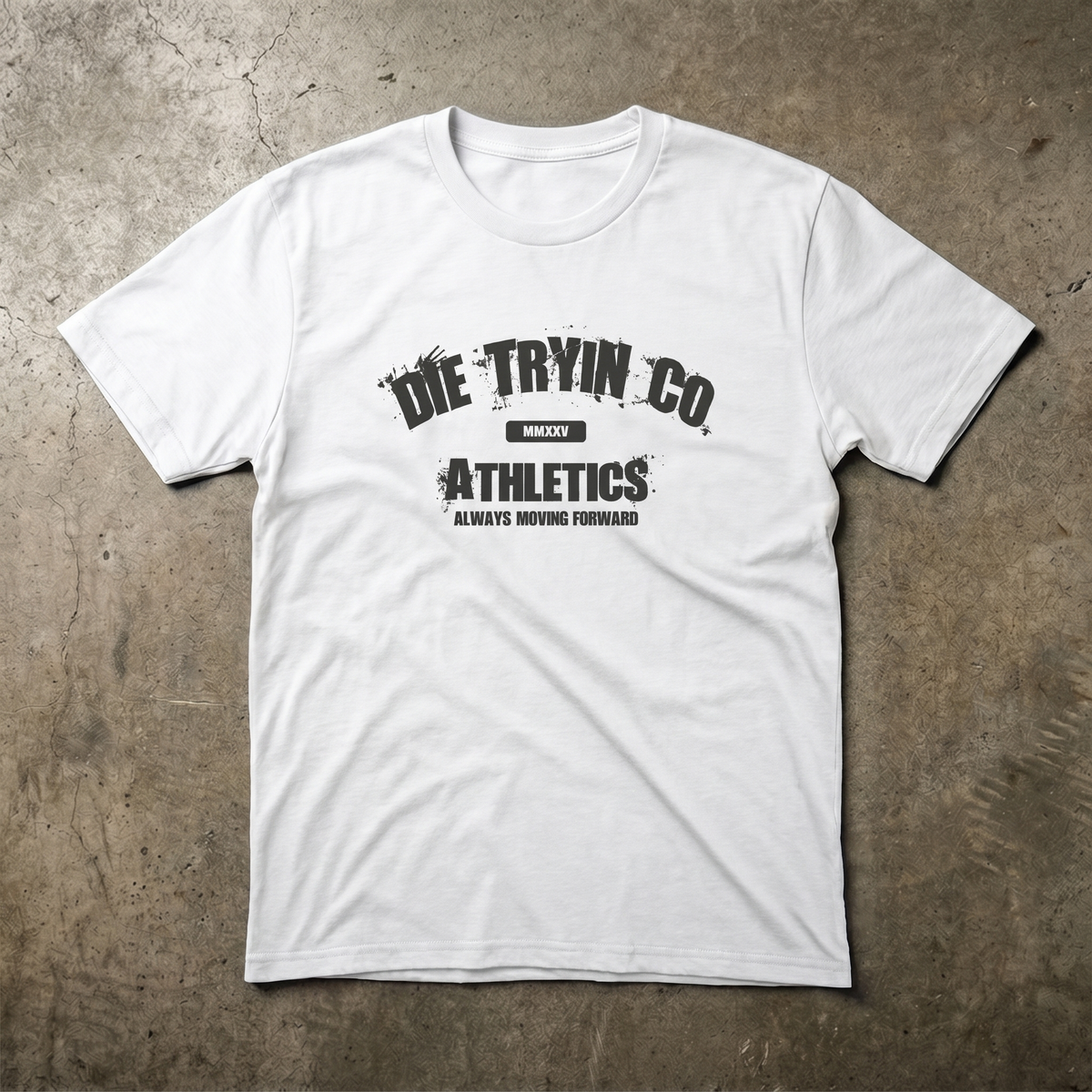DTC Athletic Tee flat lay in white on concrete