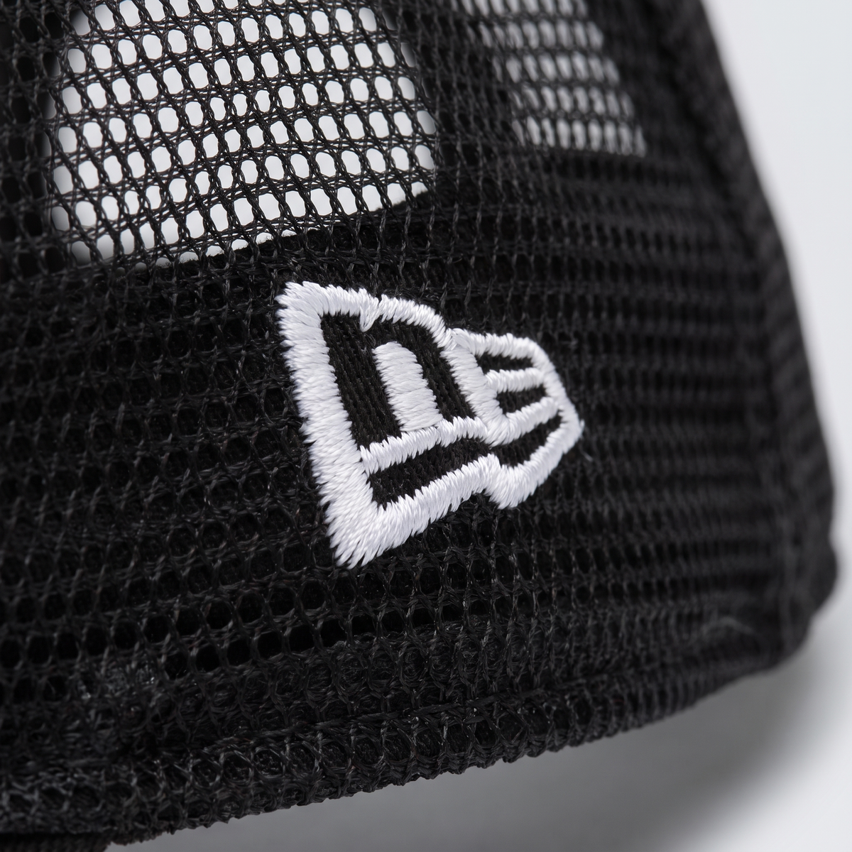 New Era logo detail on the DTC snapback