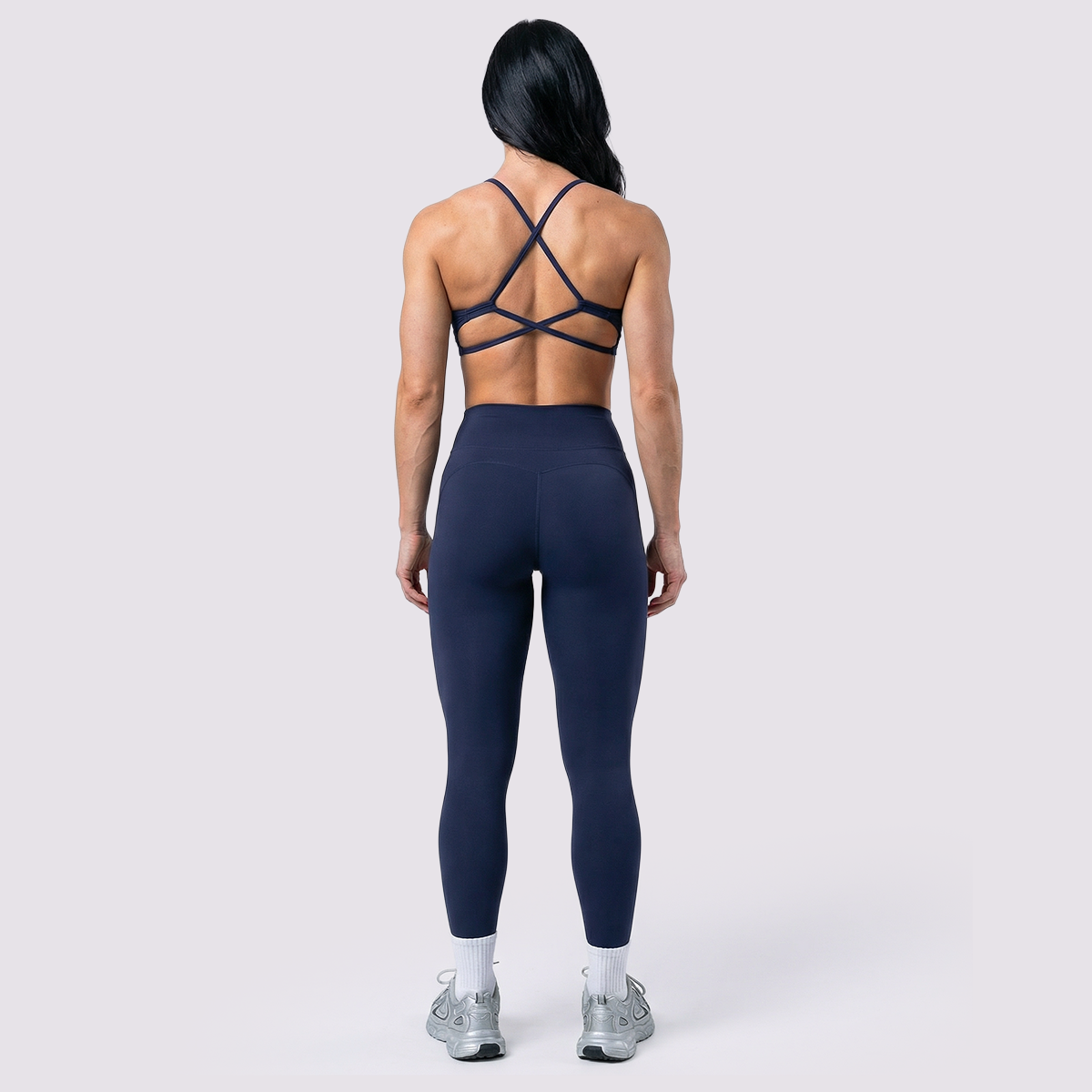 Seamless performance leggings in navy, back view