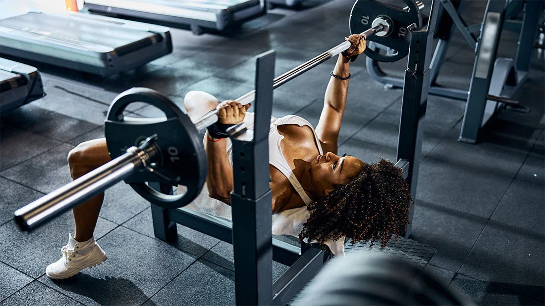 Lifter barbell bench pressing during a push day workout