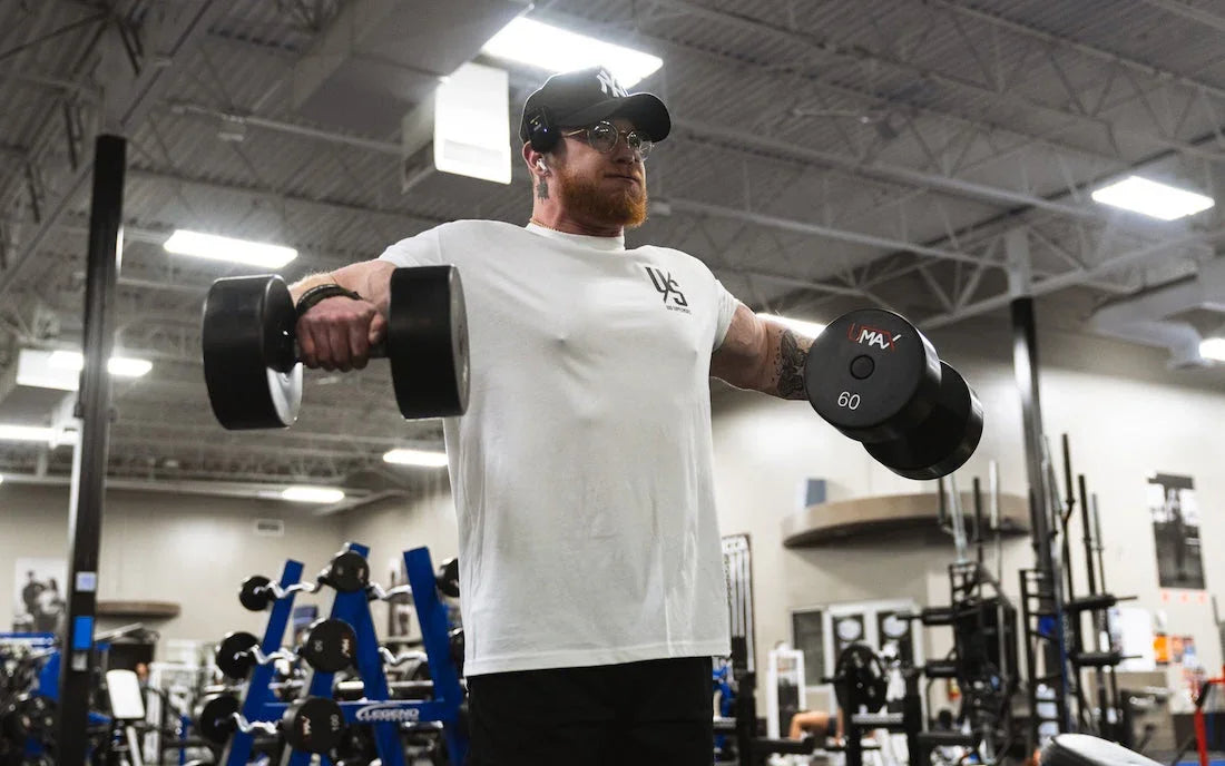 Vascular forearm mid-workout beside Project M777 pre-workout containing VasoDrive-AP