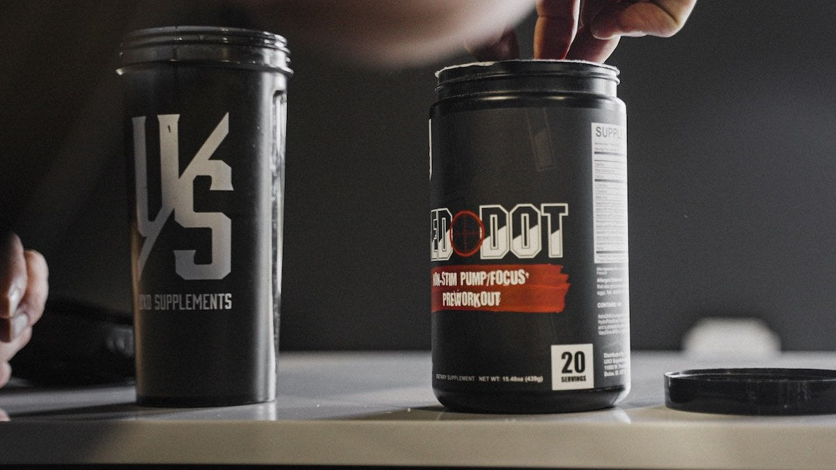 Red Dot tub + scoop showing the formula.