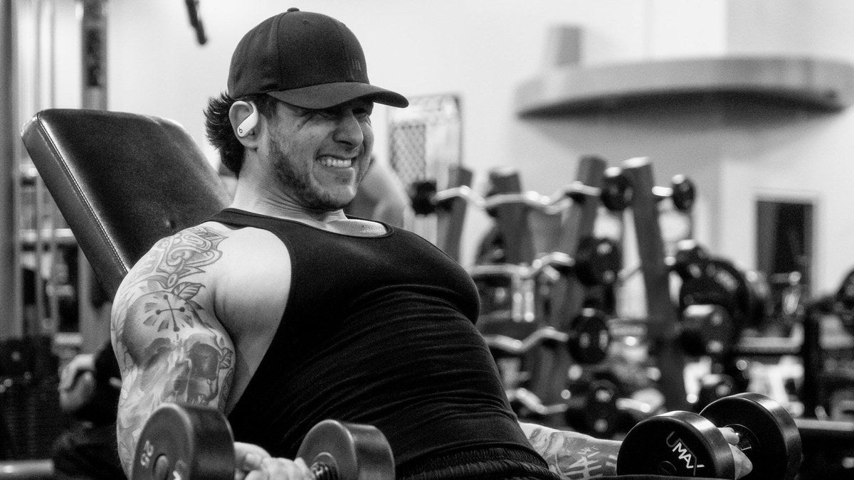 Athlete in the gym during a fat-loss cut — focused on strength training to protect muscle