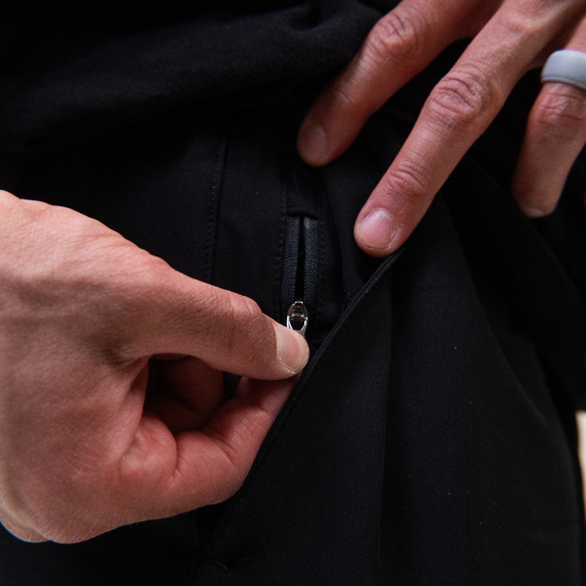 Zippered side pocket detail on the Mens Performance shorts