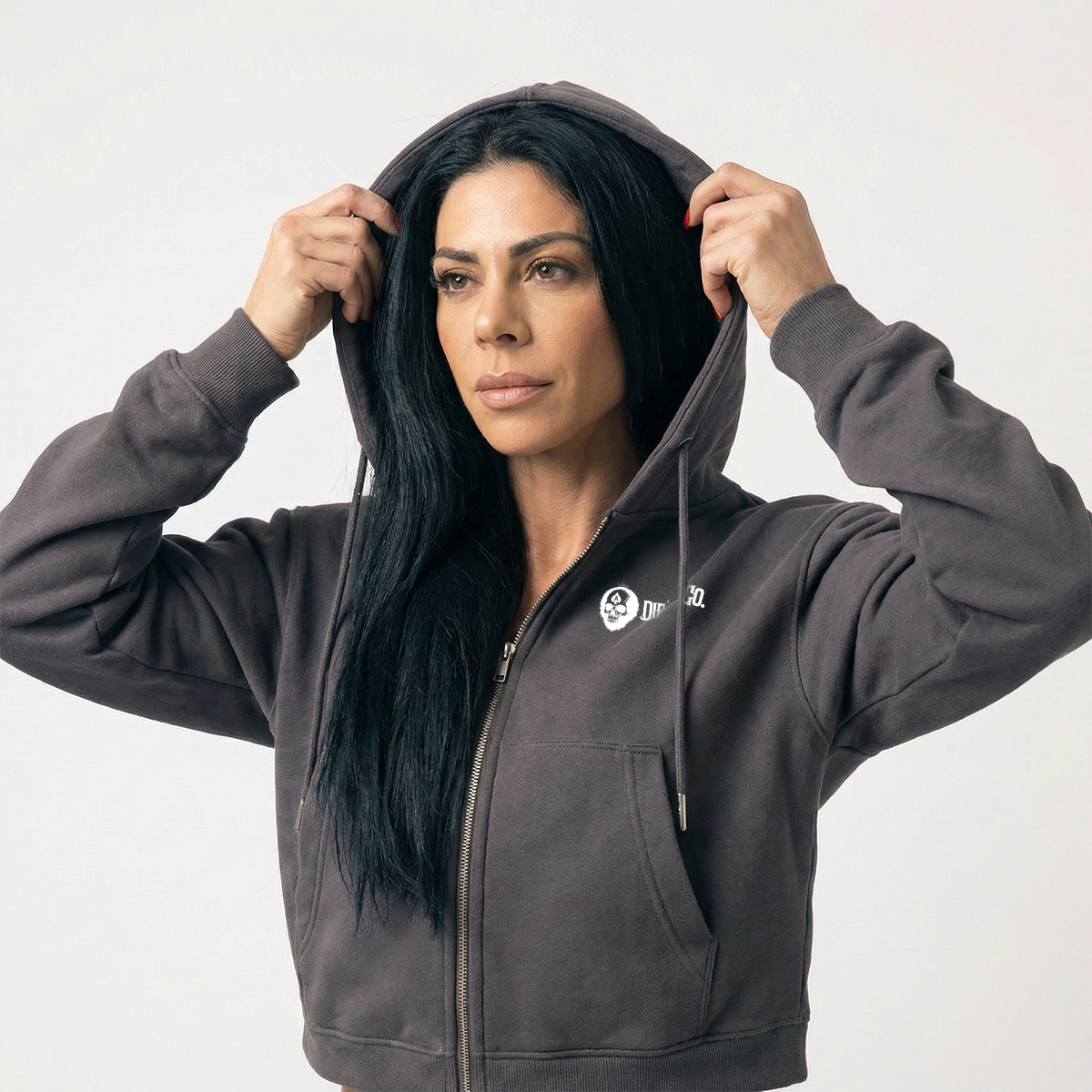 Grey cropped zip hoodie worn with the hood up
