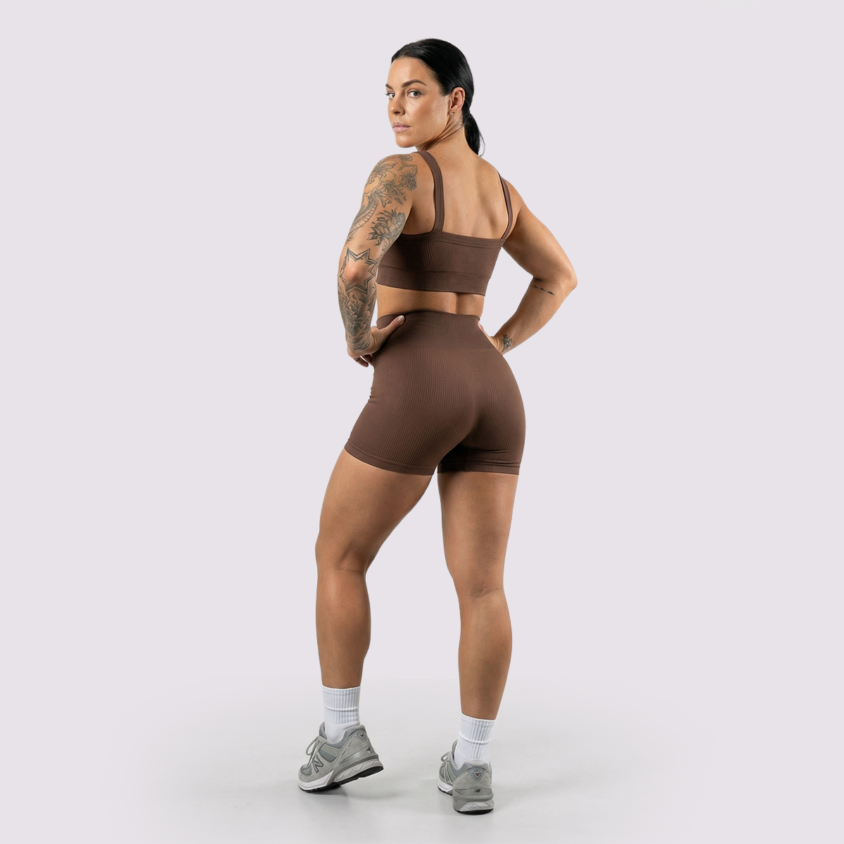 DTC ribbed performance bra and shorts set in brown, back view