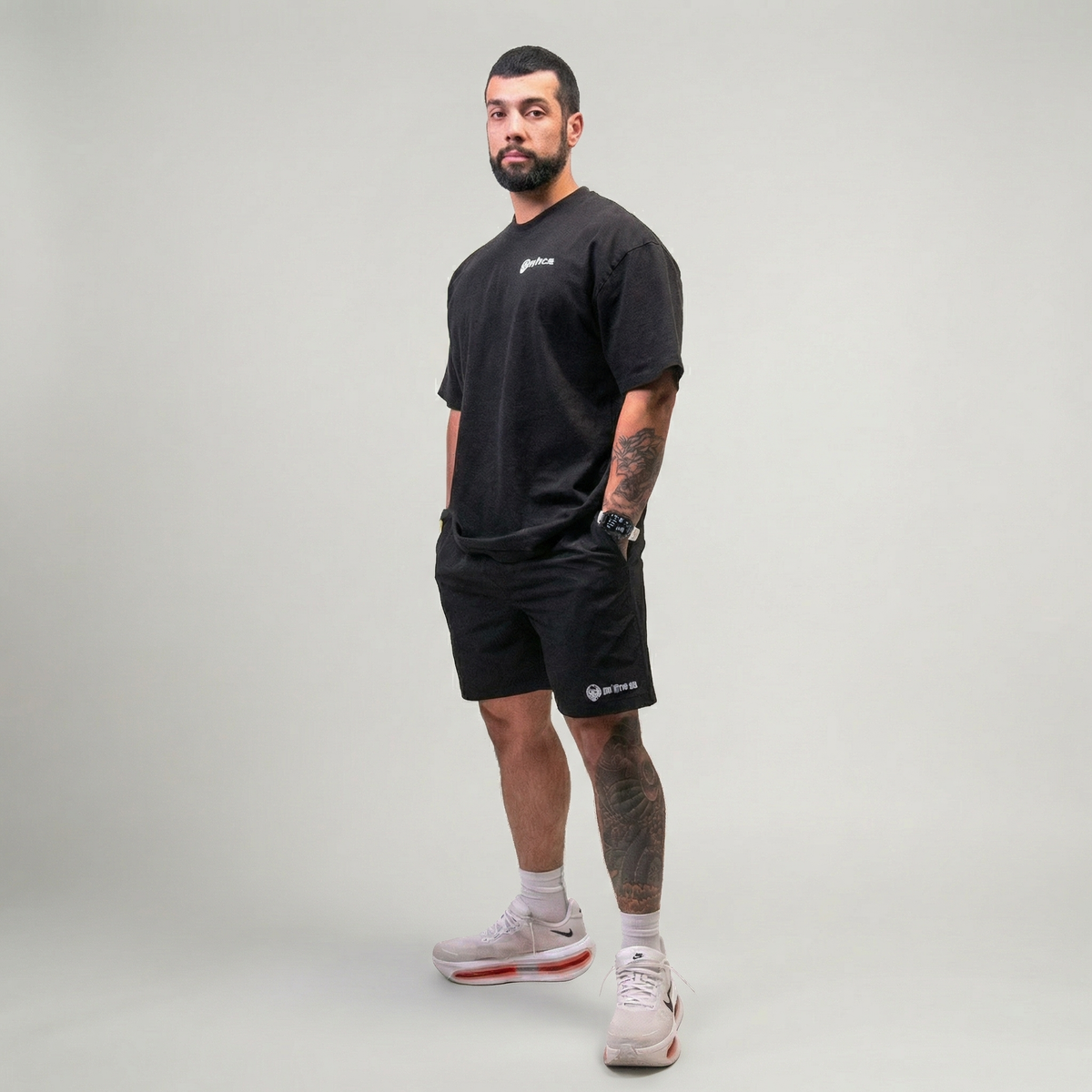 Full black DTC training outfit: performance shorts with matching tee
