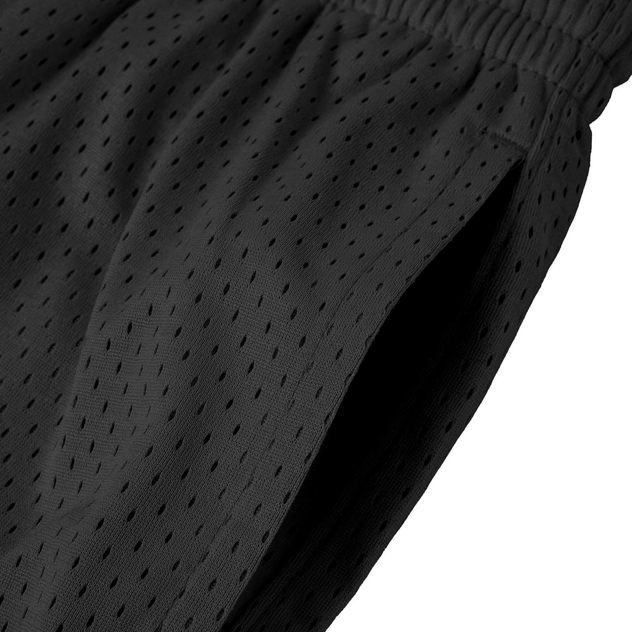 Pocket and waistband detail on the black mesh training shorts