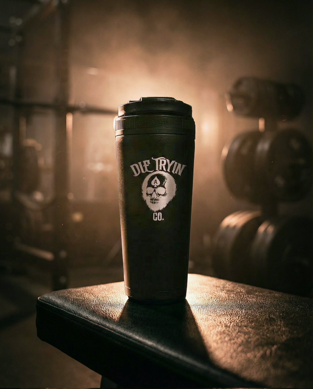 Stainless steel Ice Shaker in black photographed in a gym