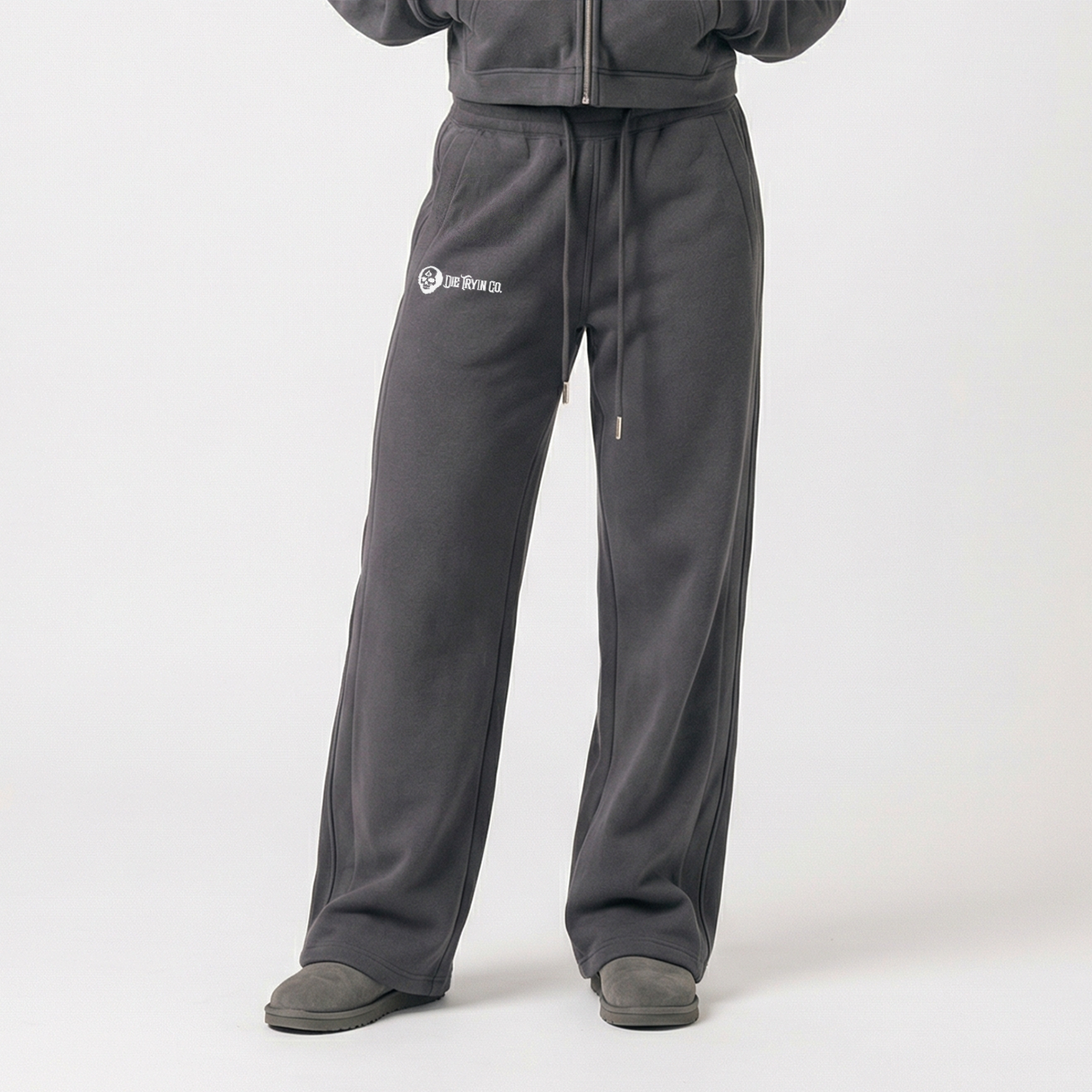 Women’s joggers flat lay in grey