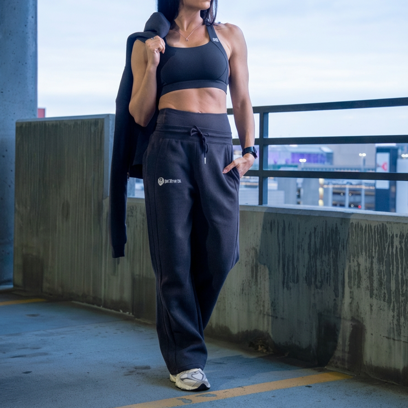 Women’s joggers in navy, full outdoor view